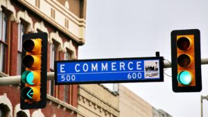 funding for dropshipping blog feature image with ecommerce on street sign