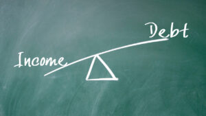 business debt consolidation blog feature image - scales with income on one side and debt on the other