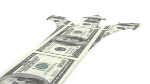 cash flow loan blog feature image with cash laid down like a road and three different arrow directions