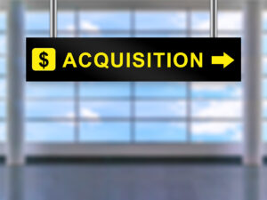 business-acquisition-financing-blog-feature-black-sign-with-acquisition-arrow-and-dollar-sign