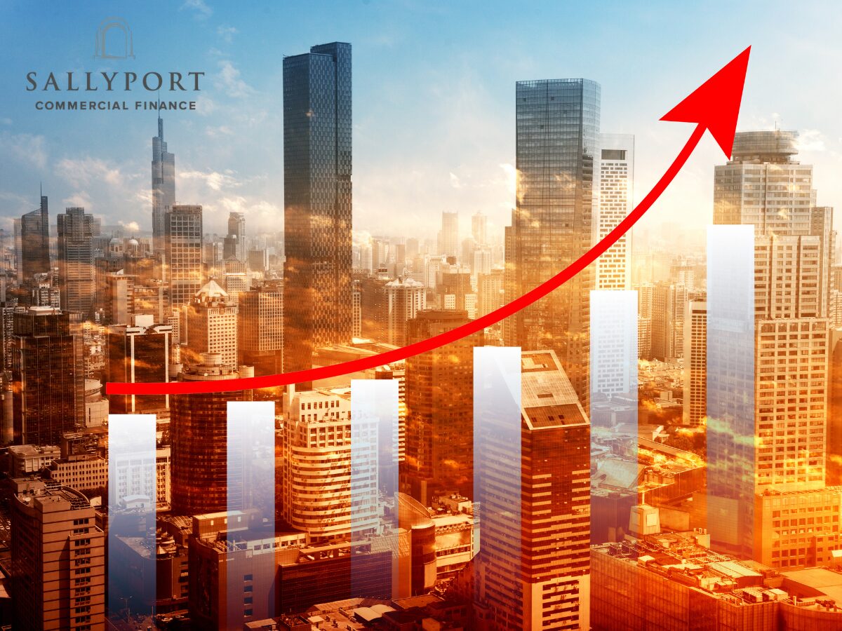 when-to-scale-blog-feature-image-graph-with-upwards-arrow-over-city